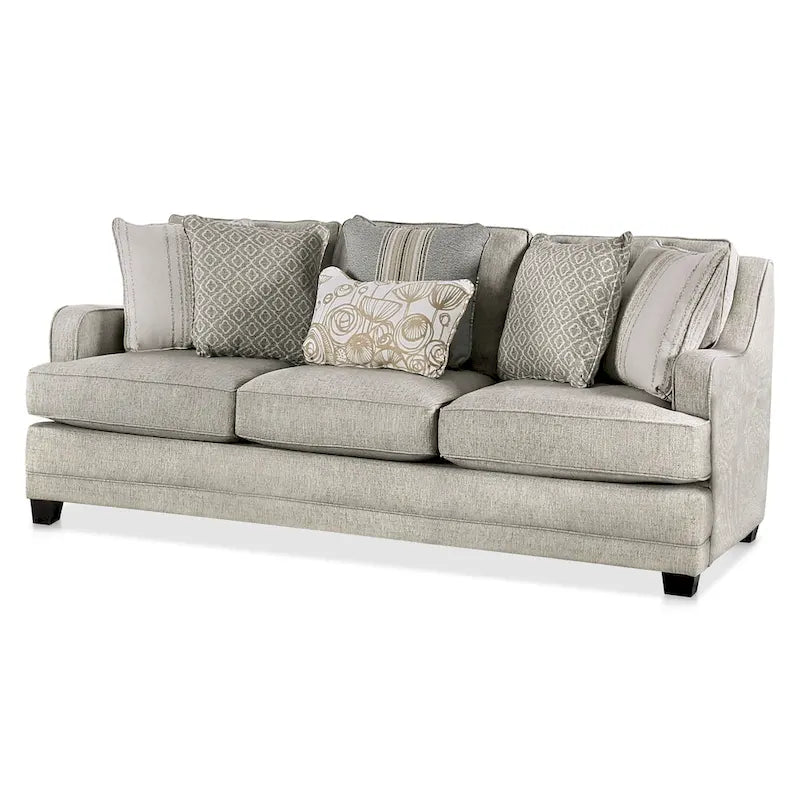 Canapé en tissu gris de style transitoire avec coussins décoratifs
